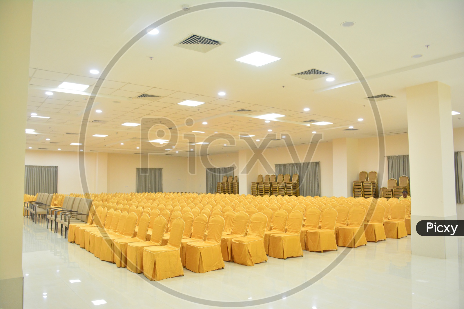 Chairs Arranged In Rows At a Function Hall Or  Convention Hall