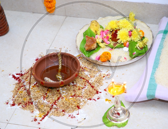South Indian Wedding Ritual Scenes With Dias And Flowers In Plates