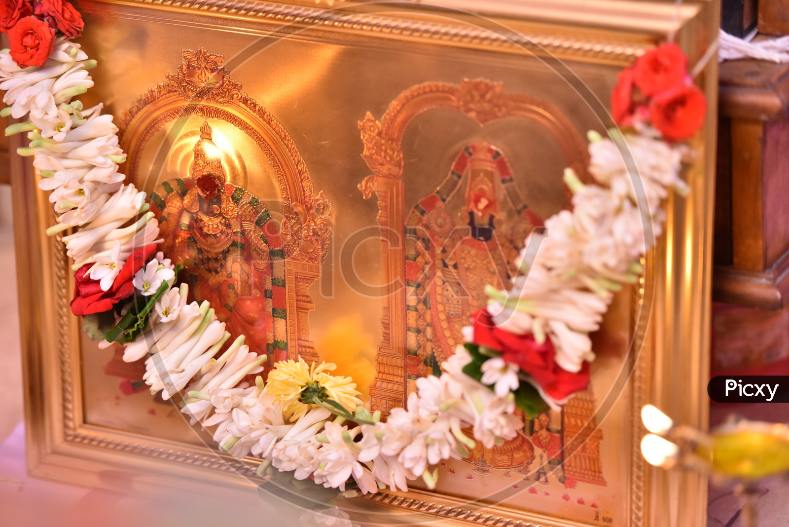 Image of Fresh Flower Garlands To Hindu God Photo FramesVP315921Picxy