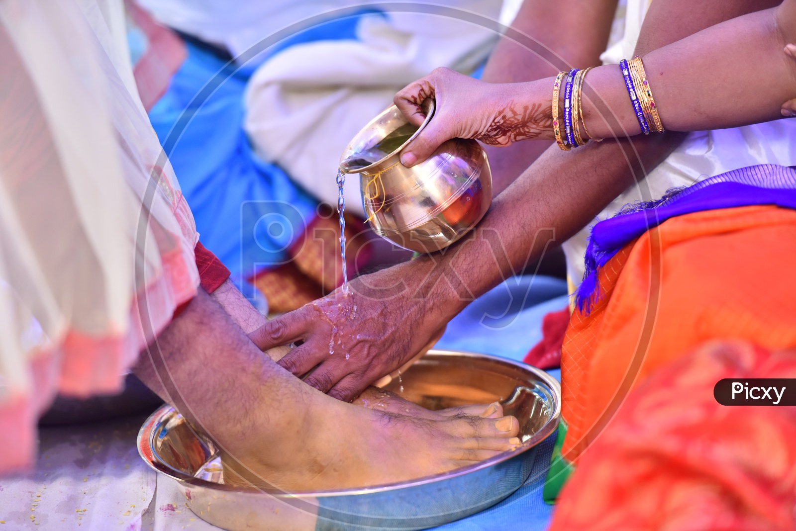 Bride Parents Washing Bridegrooms Legs In a Bowl  In Telugu Weddings