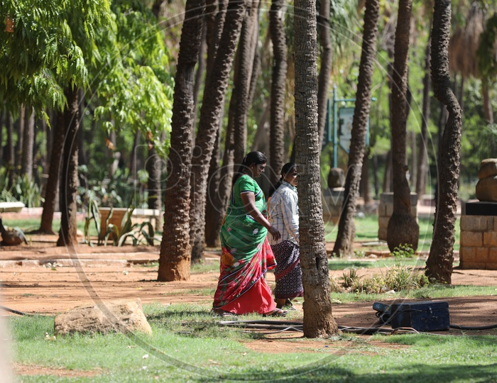 Gardening Women  Workers in a Park