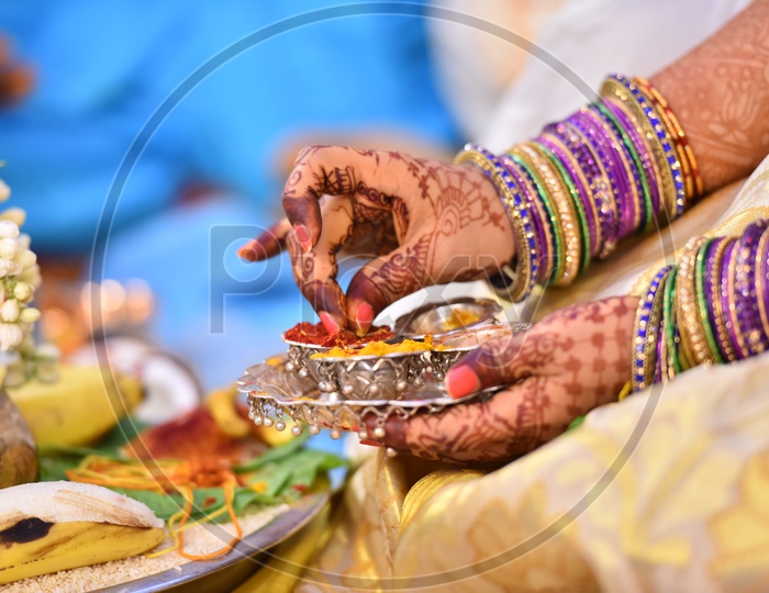 Couple Performing  Pooja Or Puja For  Kalash Or Kalasham  In Wedding or Marriages