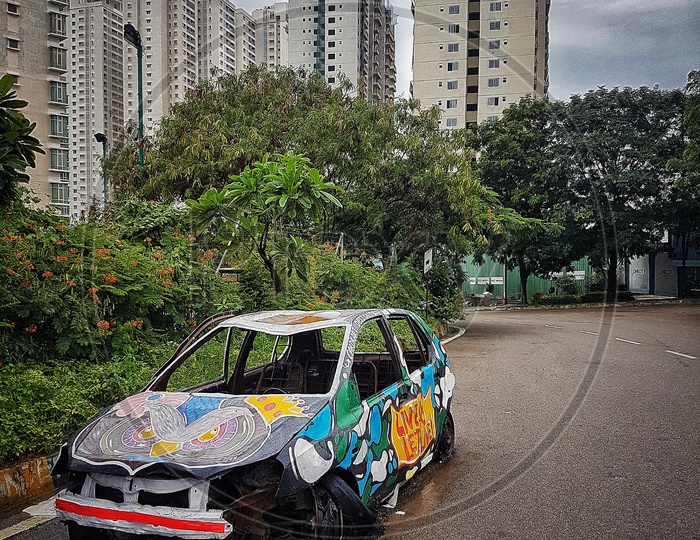 A abandoned car which got a taste of art