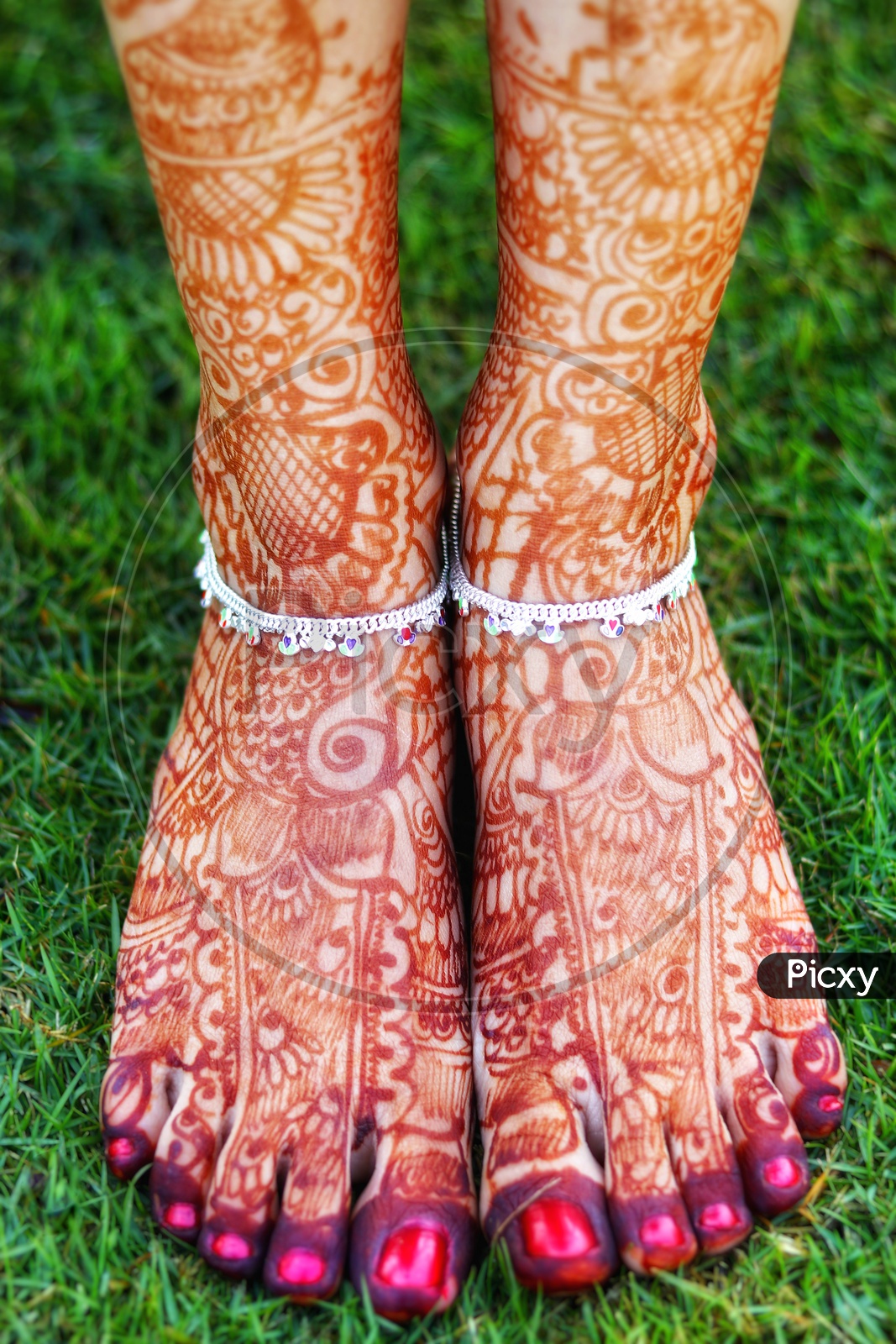 Indian bride showing feet mehndi design her wedding ceremony 31701841 Stock  Photo at Vecteezy