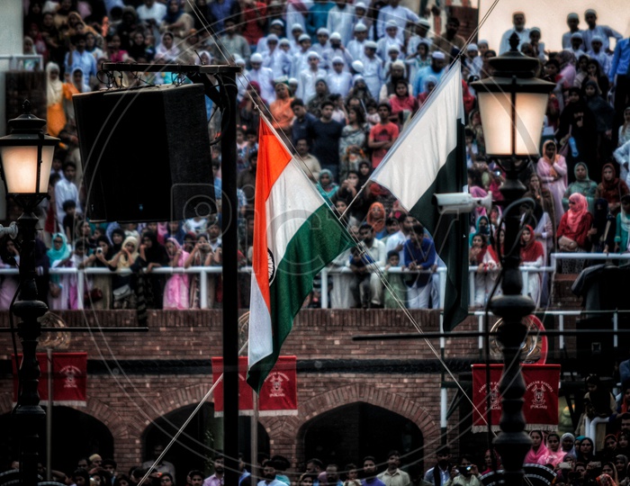 Wagah border ceremony ! When both the countries flag are summoned together so that no one will attack each other once the flag is put down until morning.