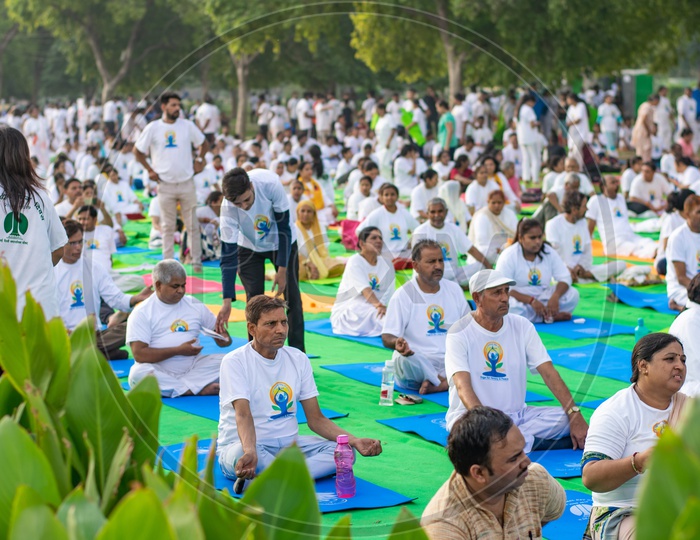 People doing yoga on the fifth International Yoga Day at Rajpath, Delhi