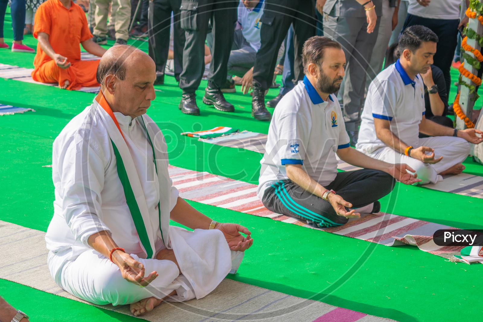 Rajnath Singh ( Defence Minister of India) and Prakash Keshav Javadekar (Minister of Environment, Forest and Climate Change and Minister of Information and Broadcasting) in Yoga Mudra