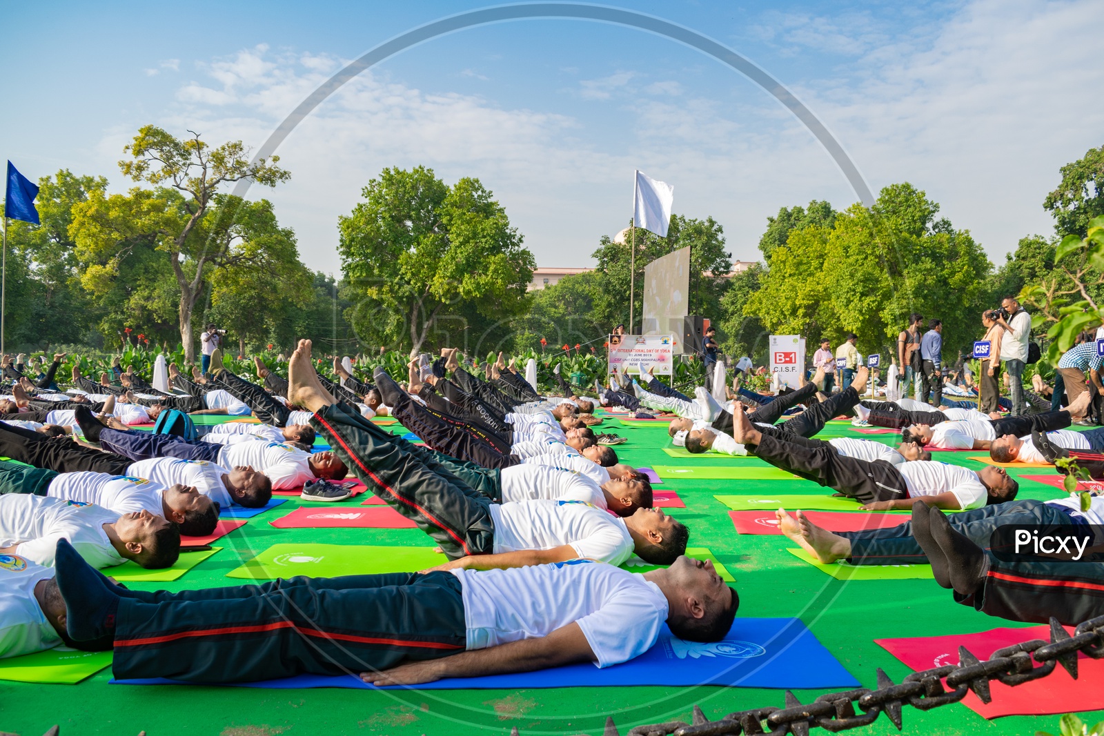 Men doing Uttanpadasana yoga on the International Day of Yoga 2019 at Rajpath, Delhi