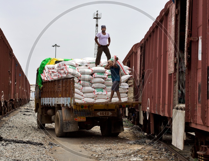 Goods being unloaded from a Goods train.