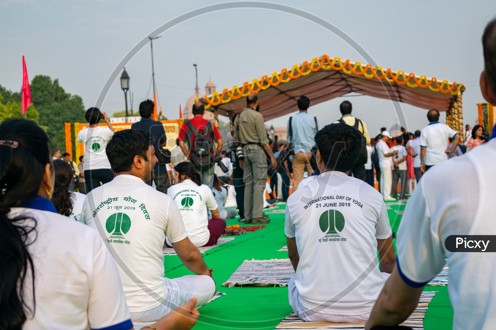 People wearing t-shirts of International Day of Yoga, 2019