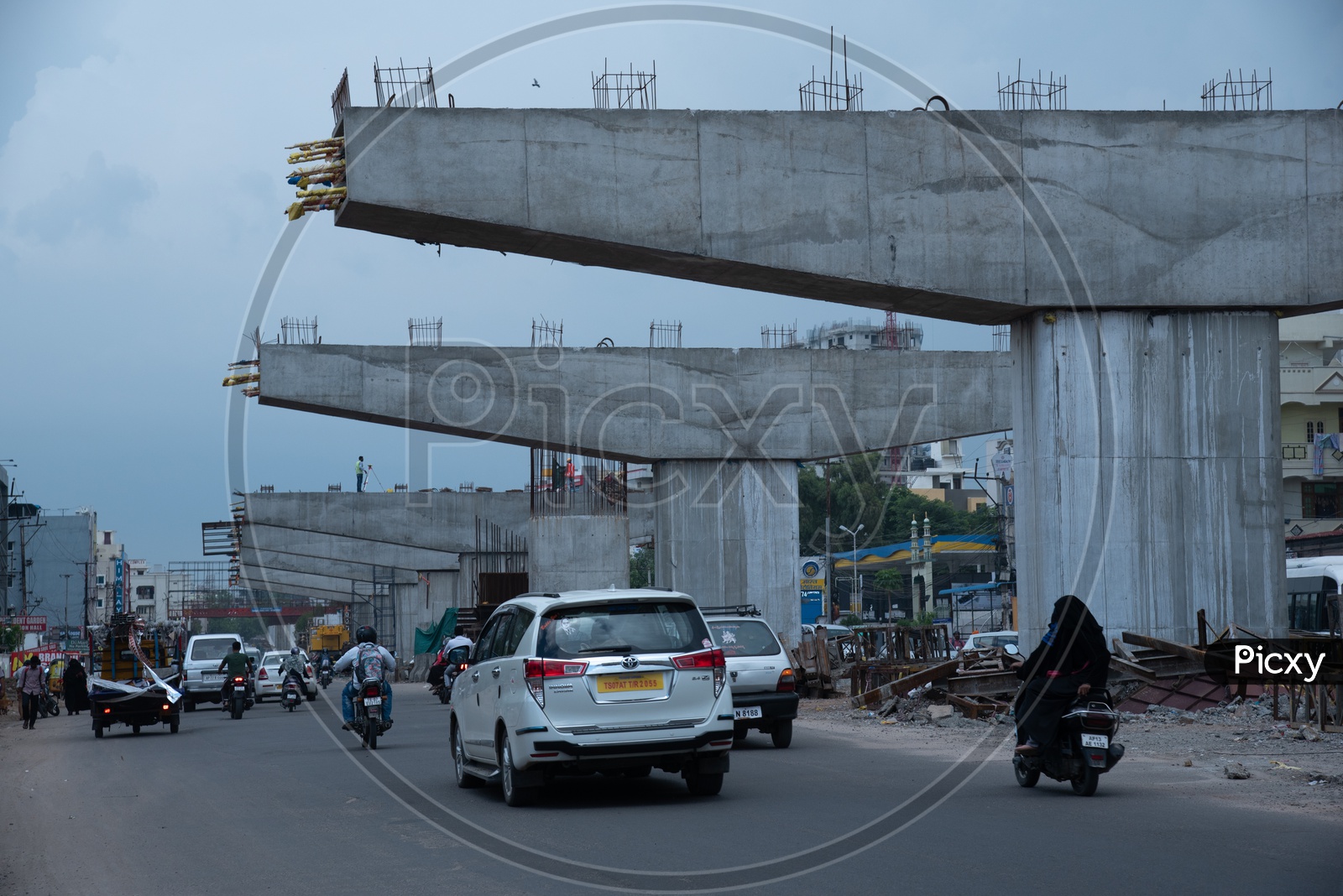 Under Construction Flyovers  With Pillars on The Roads of  Cities With Commuting Vehicles  On the Roads
