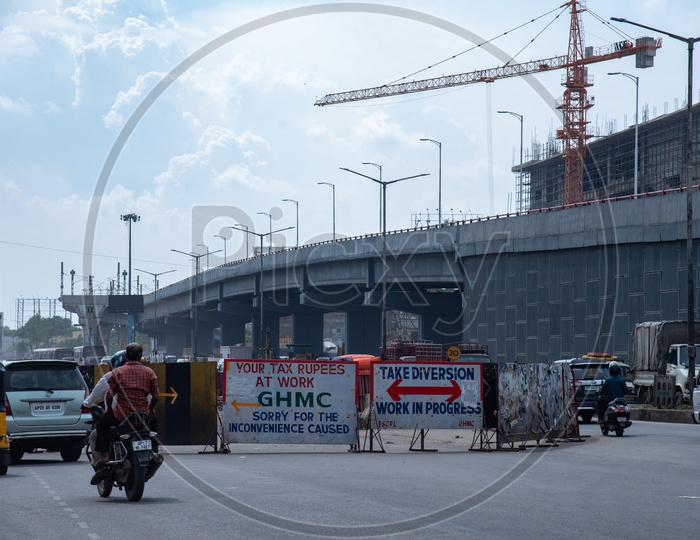 Under Construction Flyovers  With Pillars on The Roads of  Cities With Commuting Vehicles  On the Roads