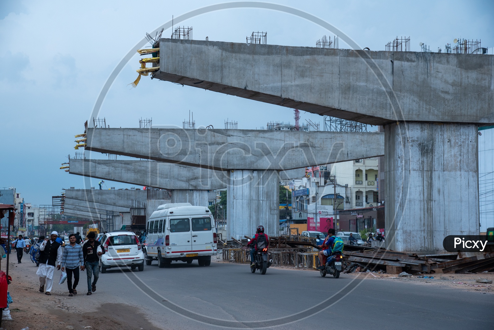 Under Construction Flyover  in Urban cities  With Pillars Construction and Commuting Vehicles