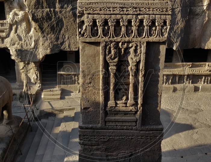 Architecture Of Ancient Kailash Temple  With Pillars And Stone Carved Sculptures  at Ellora Caves