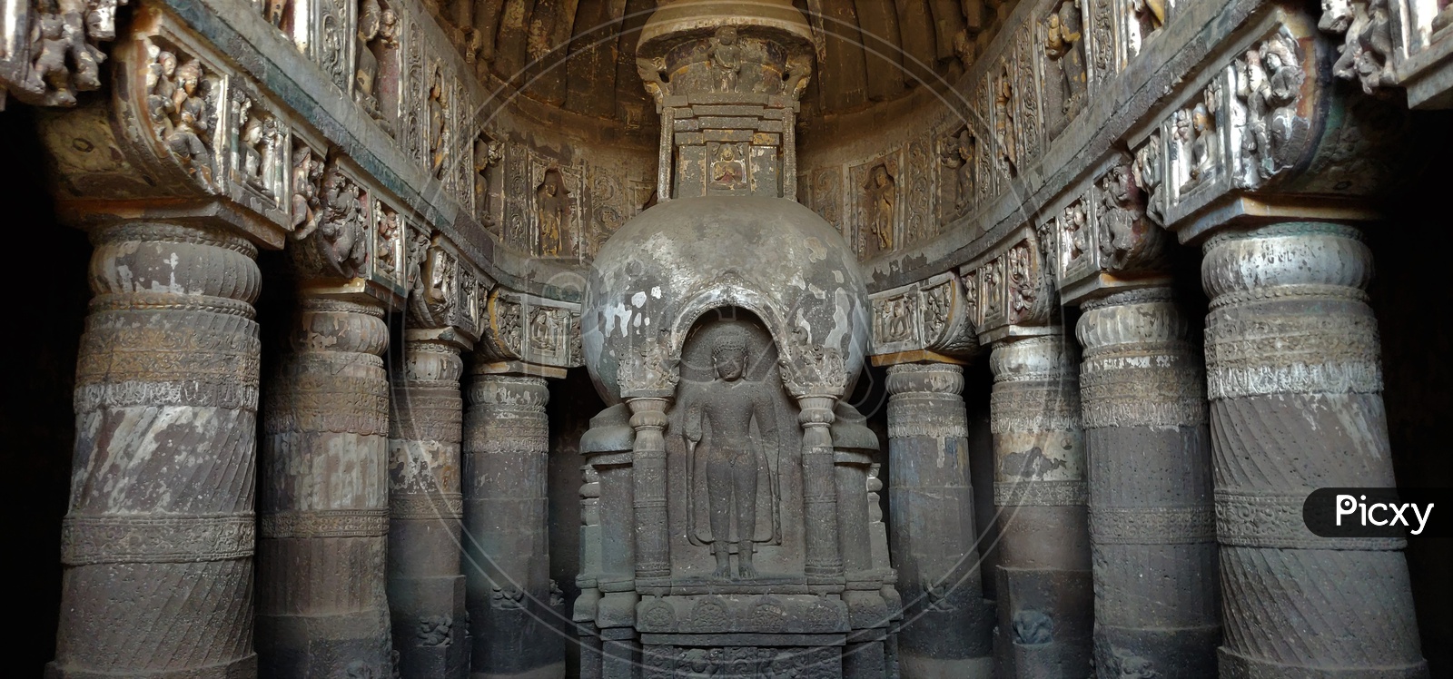 Ancient Stone Cravings Of  Ancient Buddhist temples  at Ajanta Caves    Or  Tourist Attraction Of  Ancient Caves At Ajanta in Deccan Plateau