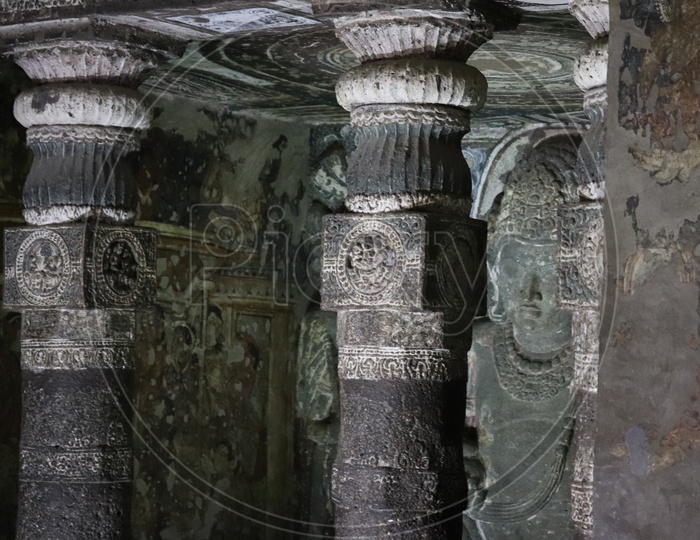 Architecture  With Stone Craved Pillars And Designs On them At Ajanta Caves