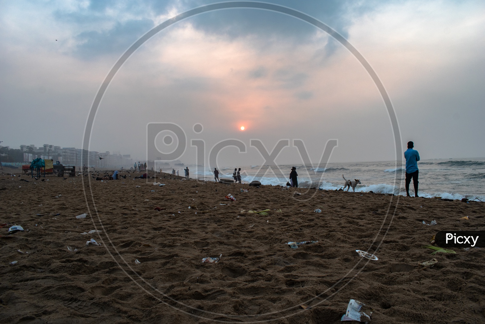 People/Group of people enjoying the sunrise view at Rama Krishna beach (R.K.Beach), Vishakapatnam/Vizag.