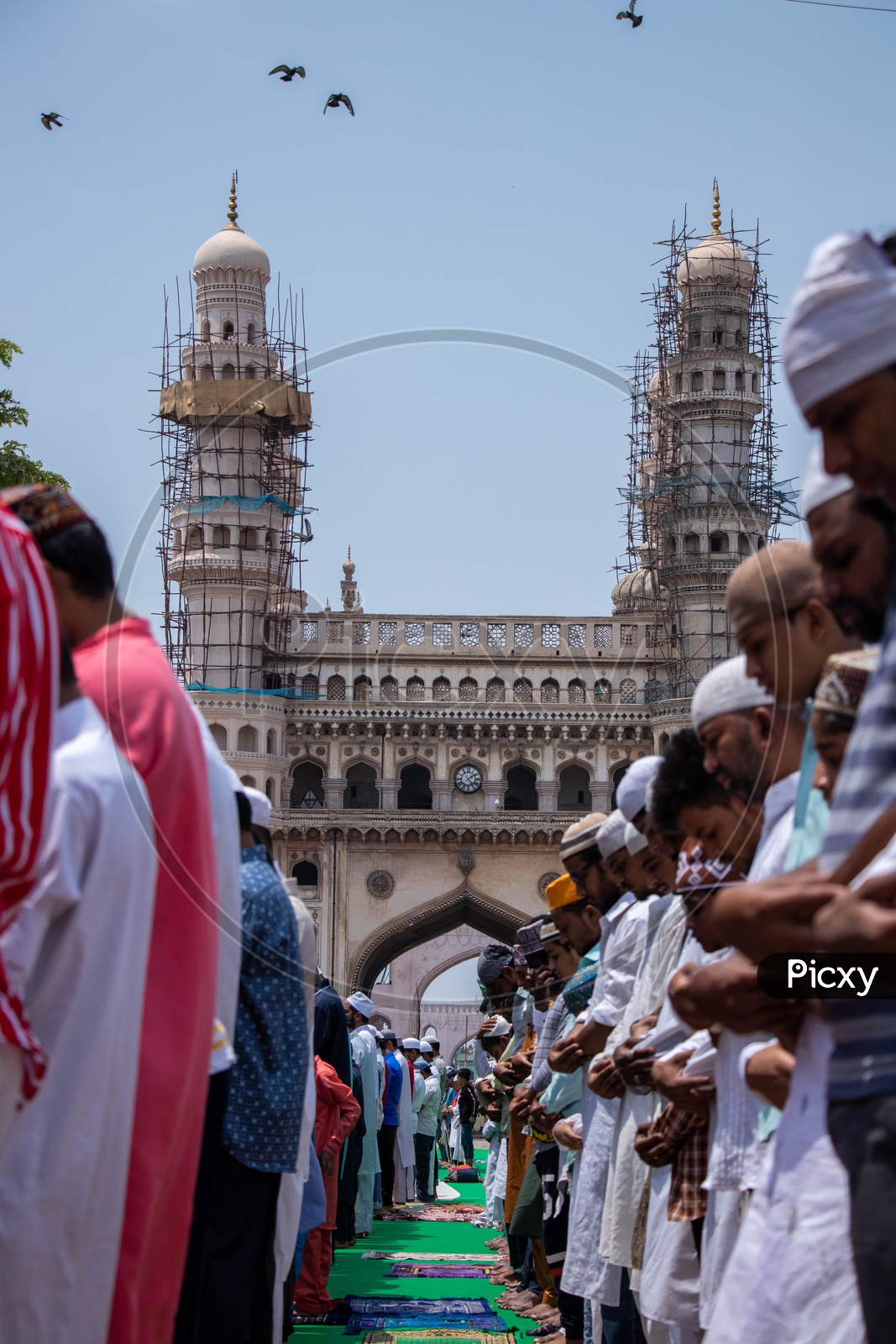 Muslims  Offering Prayer Or Namaz As a Group  At Mecca Masjid  Or Mosque  Near Charminar During The Alvida Jumma  , The Last Friday Prayer In Ramzan or Ramadan Season