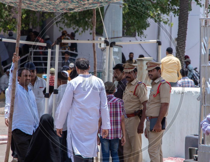 Police Security Personal Checking with Metal Detectors  At Mecca Masjid  at Alvida Jumma