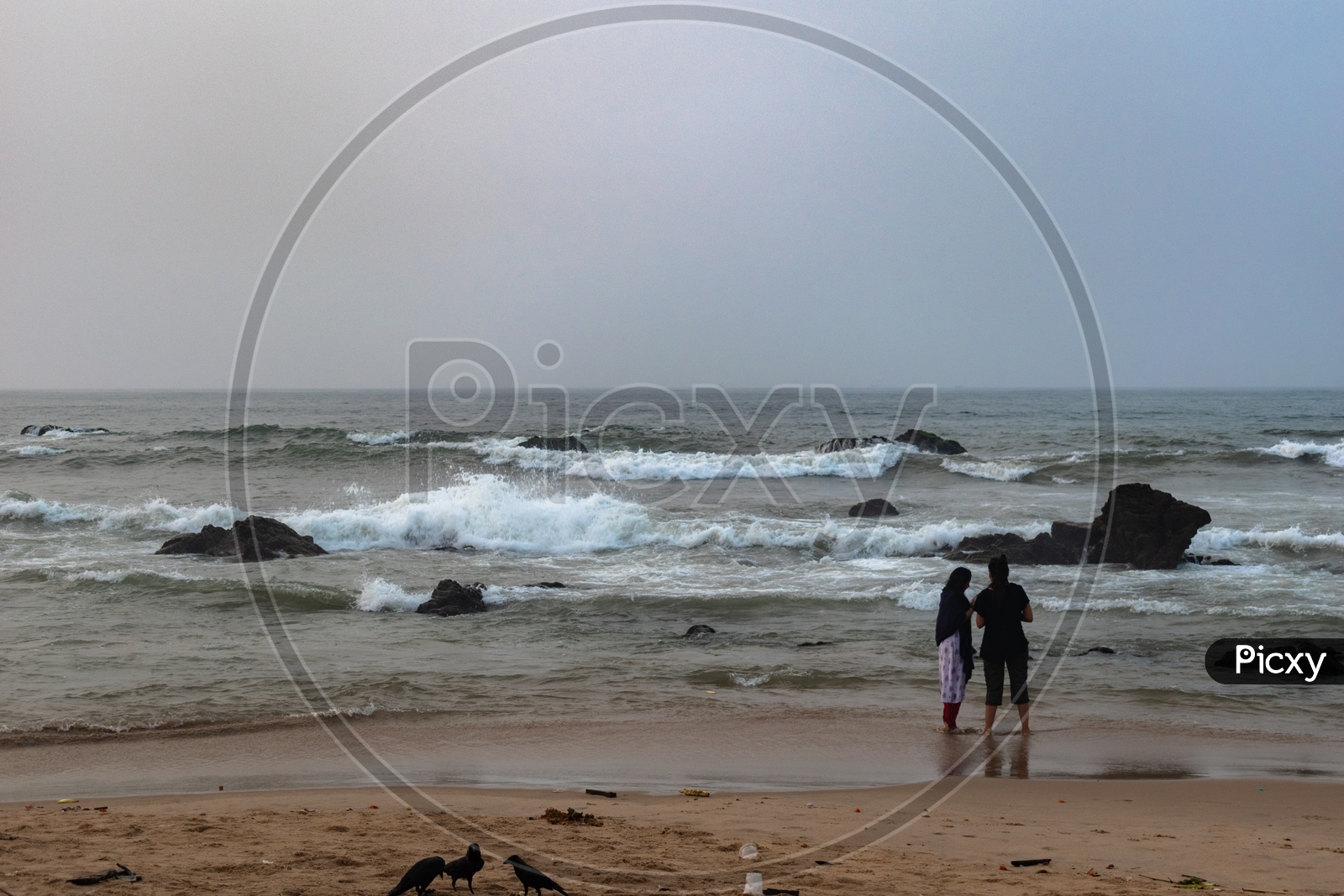 Mother &  daughter enjoying the beach view at Rama Krishna beach (R.K.Beach), Vishakapatnam/Vizag.
