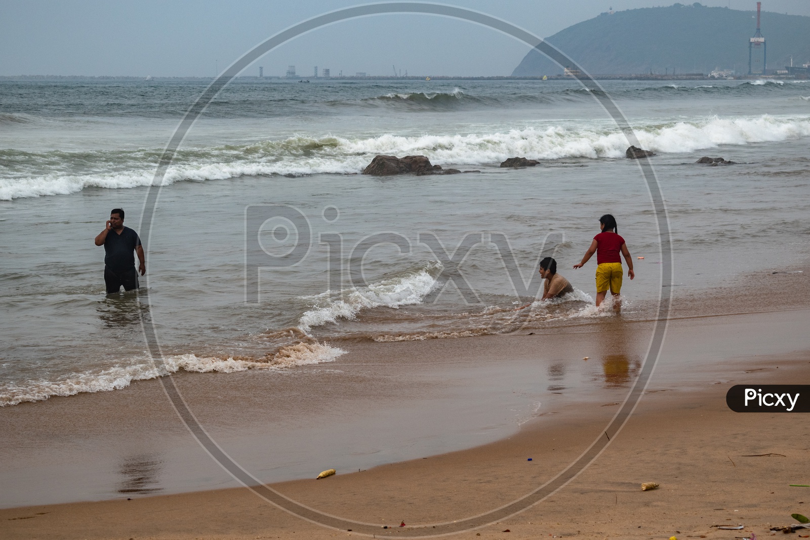Father, Son & daughter enjoying at Rama Krishna beach (R.K.Beach), Vishakapatnam/Vizag.