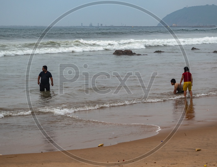 Father, Son & daughter enjoying at Rama Krishna beach (R.K.Beach), Vishakapatnam/Vizag.