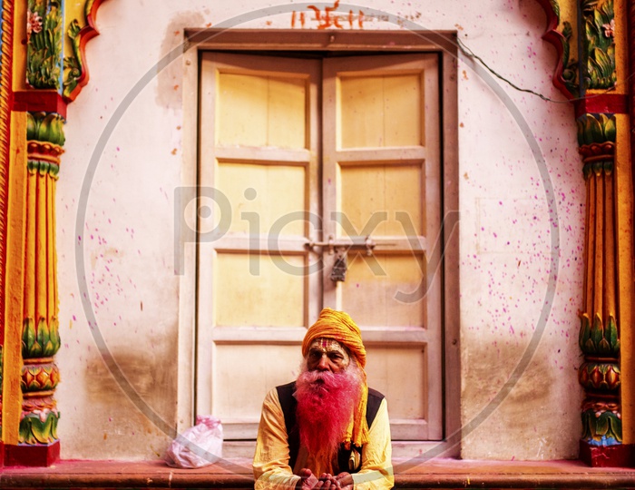 sadhu enjoying the holi.