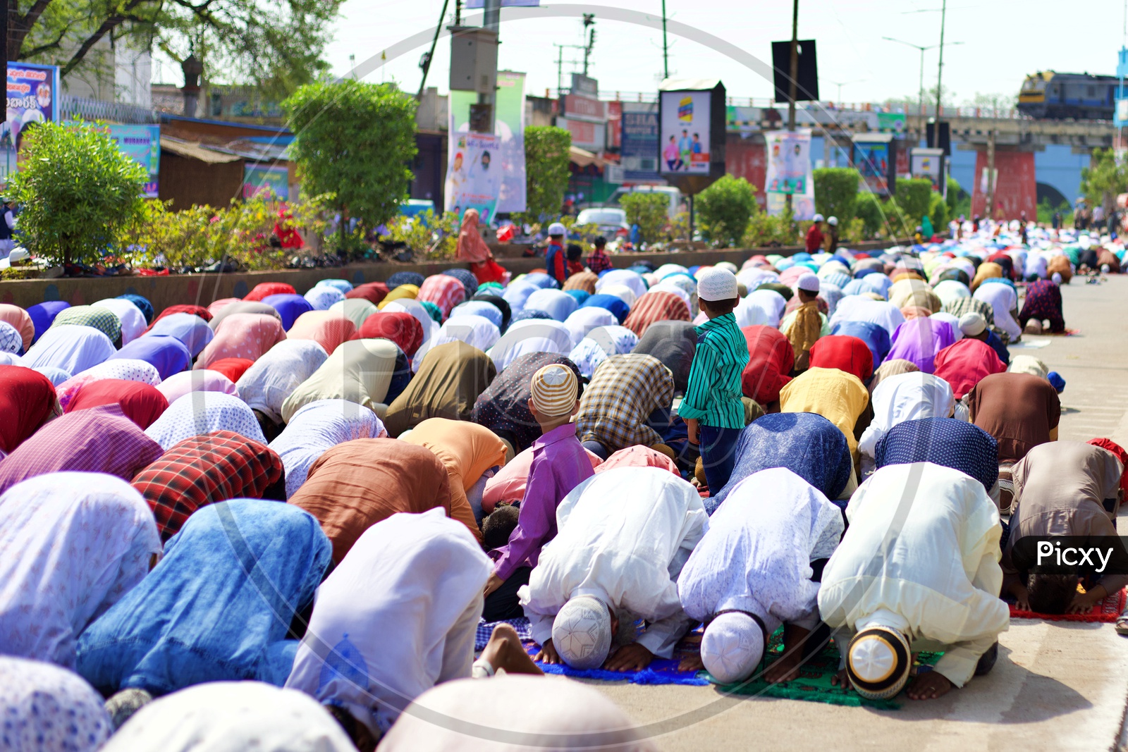 Muslims performing prayers on roads on the occasion of EID.
