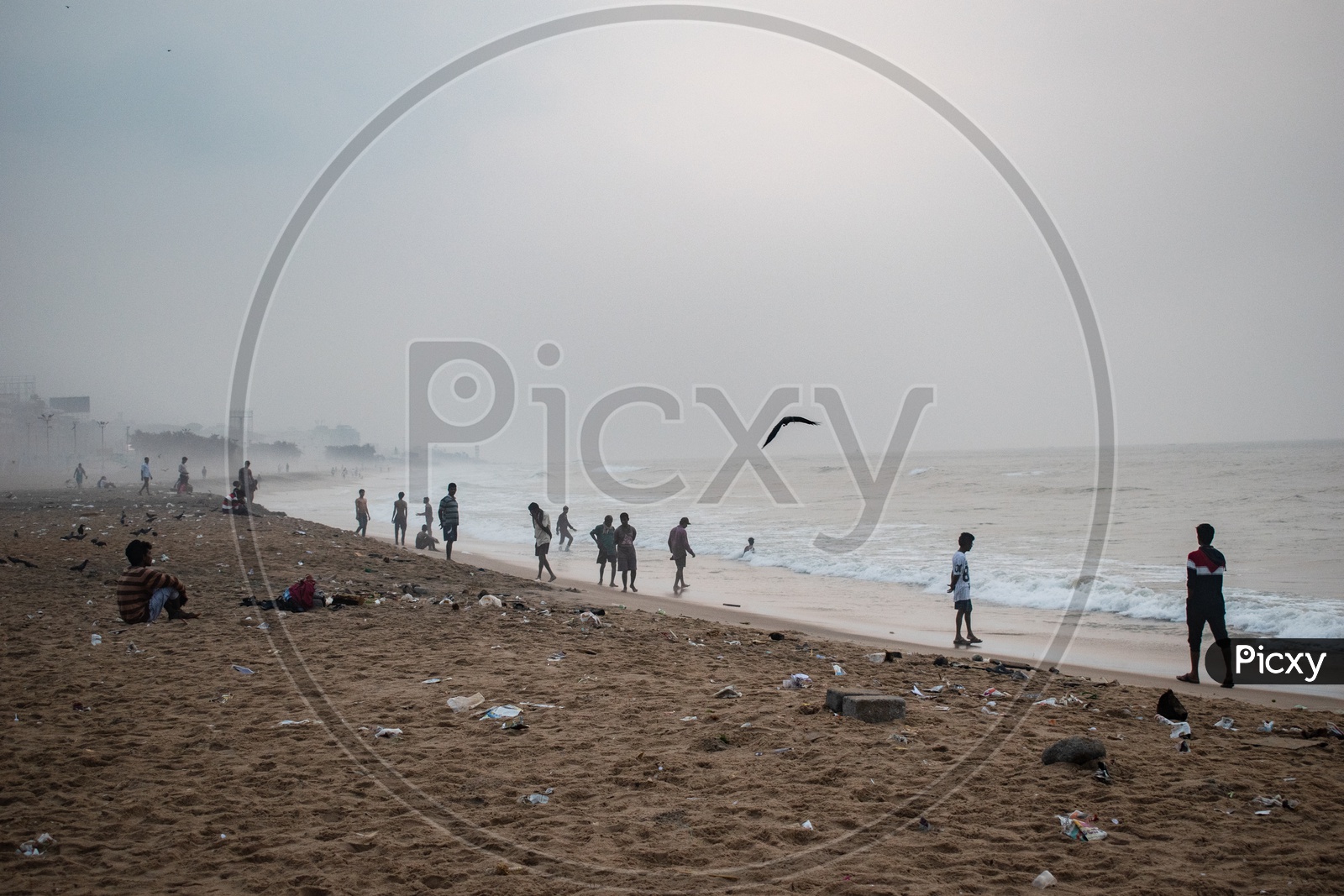 People/Group of people enjoying the beach view at Rama Krishna beach (R.K.Beach), Vishakapatnam/Vizag.