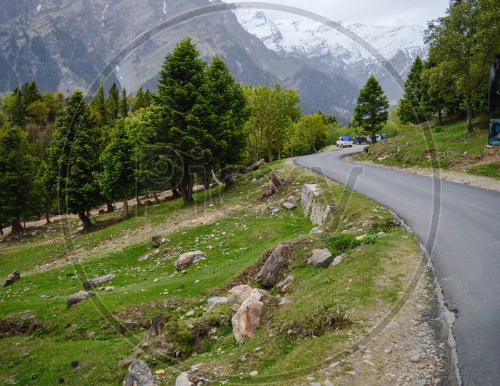 Roads Leading To Snow Capped Mountains at Rohtang Pass