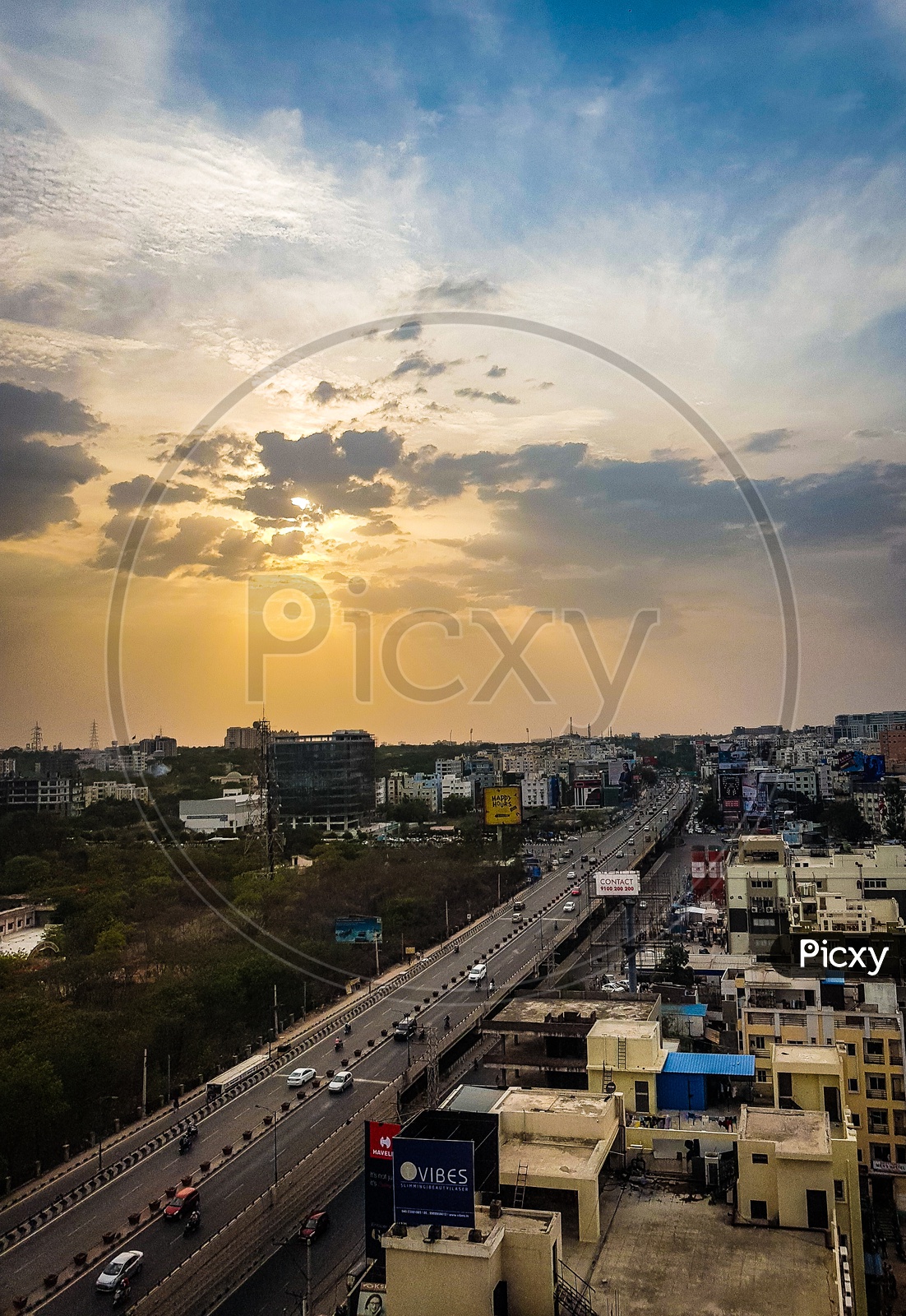 Combination of a  Beautiful Sunset and a Calm Flyover View of Gachibowli