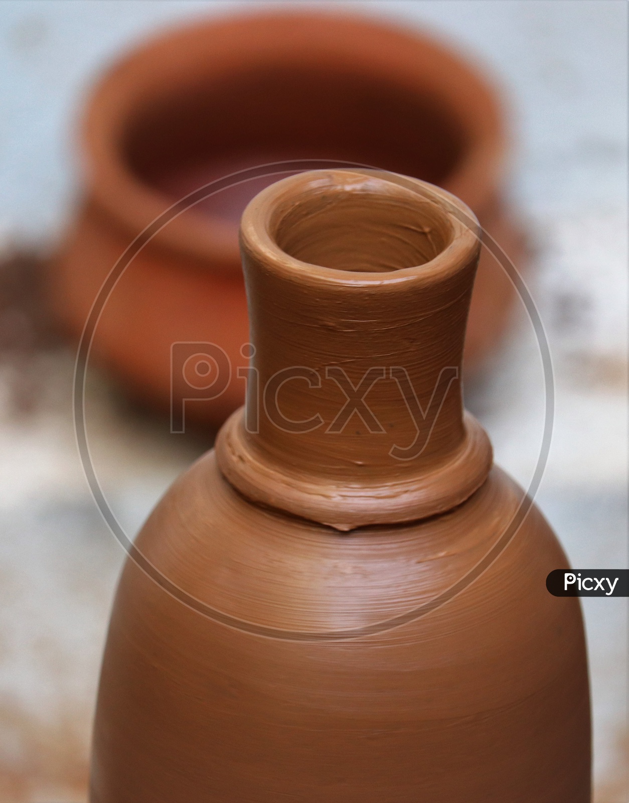Freshly Sculpted  Clay Pots By a Potter