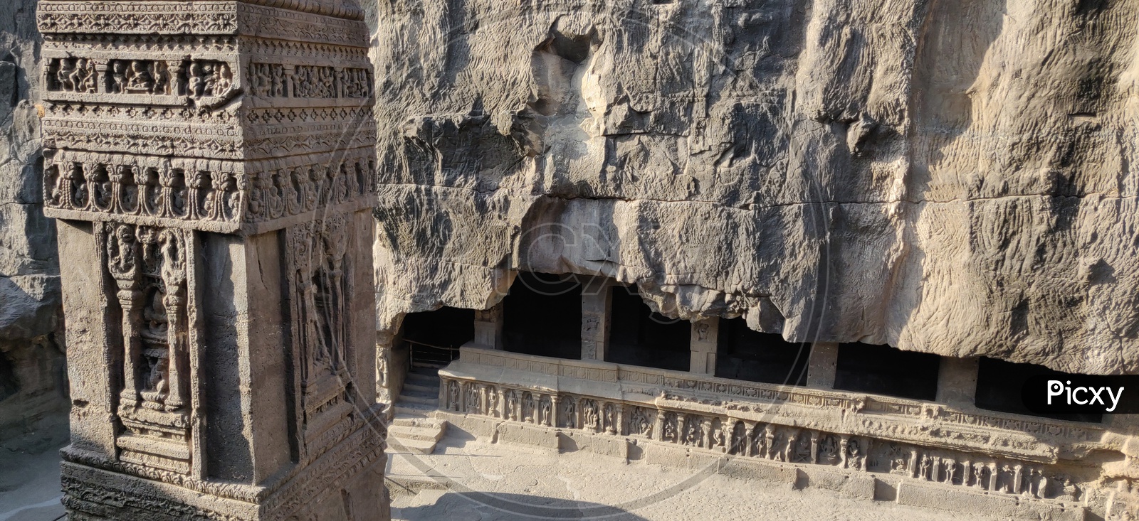 Architecture Of  Ajanta Caves With Stone Carves Pillars And Designs On Them