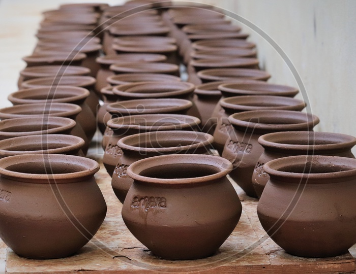 Freshly Sculpted Clay Pots Or Pottery By The Professional Potter Kept For Drying