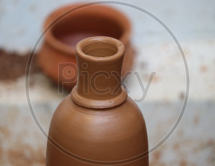 Freshly Sculpted  Clay Pots By a Potter