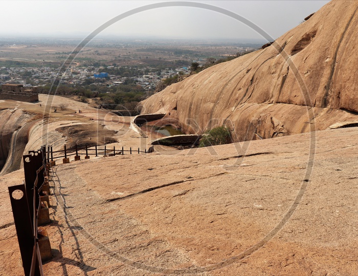 Safety Railing And Naturally Formed Stairs At The rock Hill Near Bhongir Fort