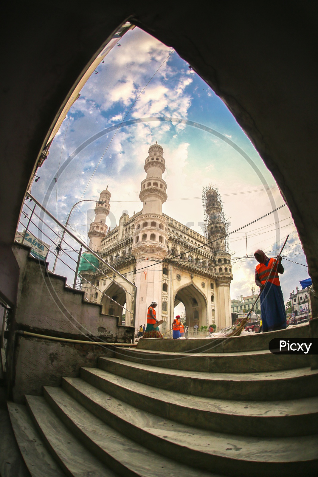 GHMC Sanity Workers or Sweepers Cleaning The Streets Of Charminar