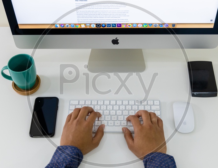 Top View Of  Businessman Hands or Fingers  Working On Computer Keyboard at Office Desk