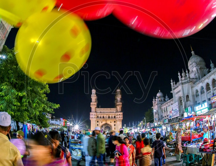 Streets Around Charminar With Vendor Stalls and Visitors