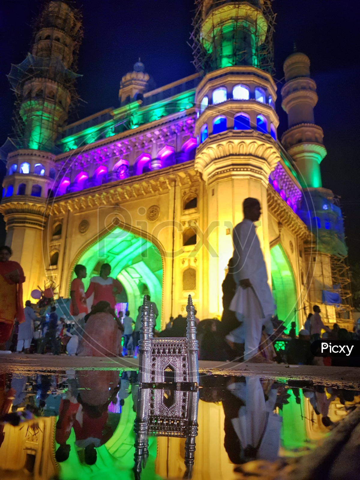 Charminar And Its Reflection on Water Surface