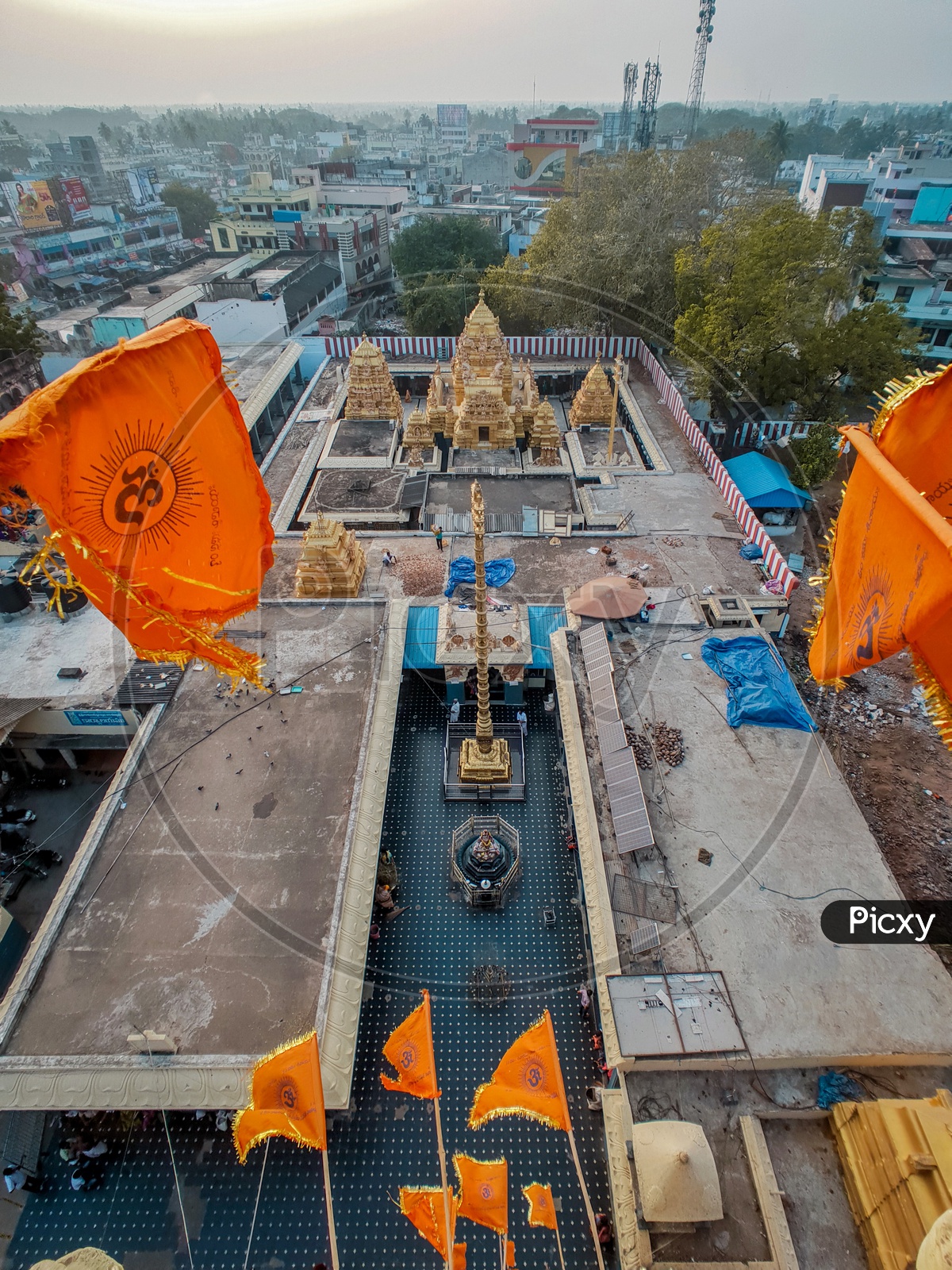 Aerial View Of a Temple Shrine With Saffron Flags