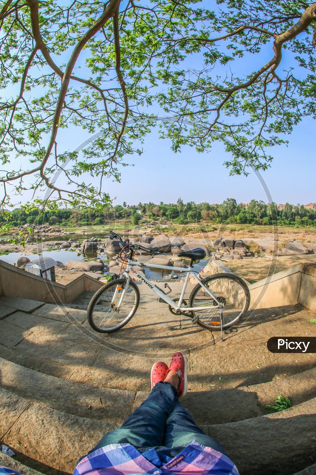 A Bicycle On the Bank of Tungabadra River Bank in Hampi