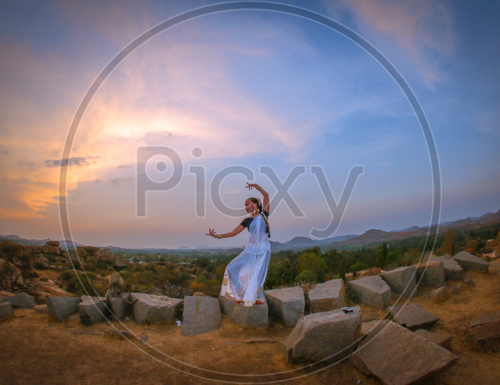 A Traditional Dancer Giving Poses At Hampi
