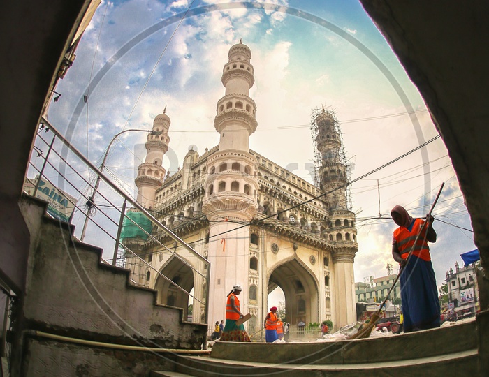 GHMC Sanity Workers or Sweepers Cleaning The Streets Of Charminar
