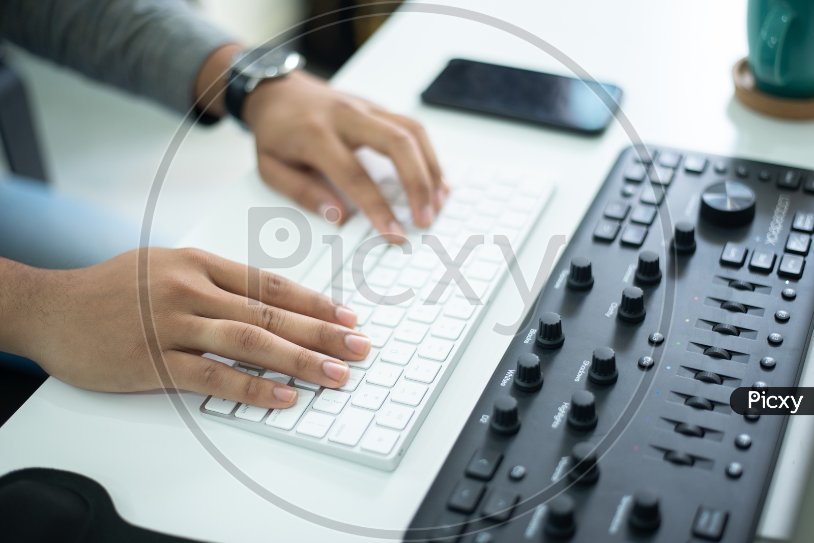 Closeup Of  Businessman Hands or Fingers  Working On Computer Keyboard at Office Desk