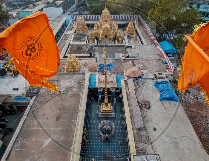 Aerial View Of a Temple Shrine With Saffron Flags