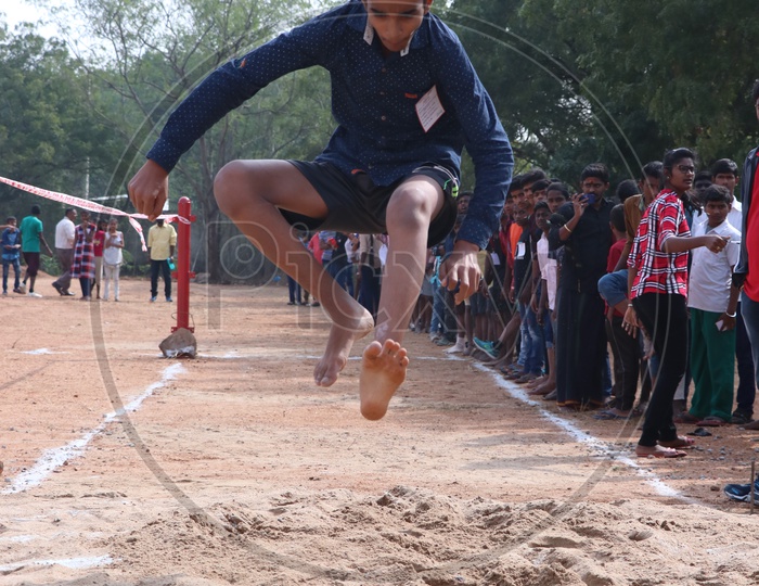 Image of Indian School Students Or Children Participating In Long Jump ...