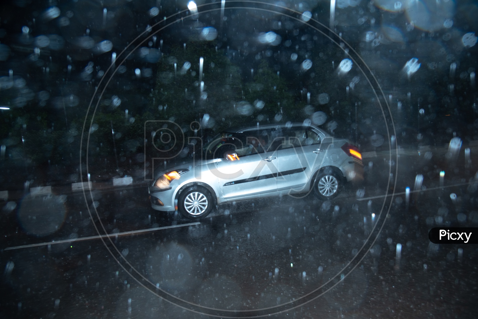 Drenching Commuting Vehicles in Monsoon Rains or Heavy Rain Fall On The urban City Roads