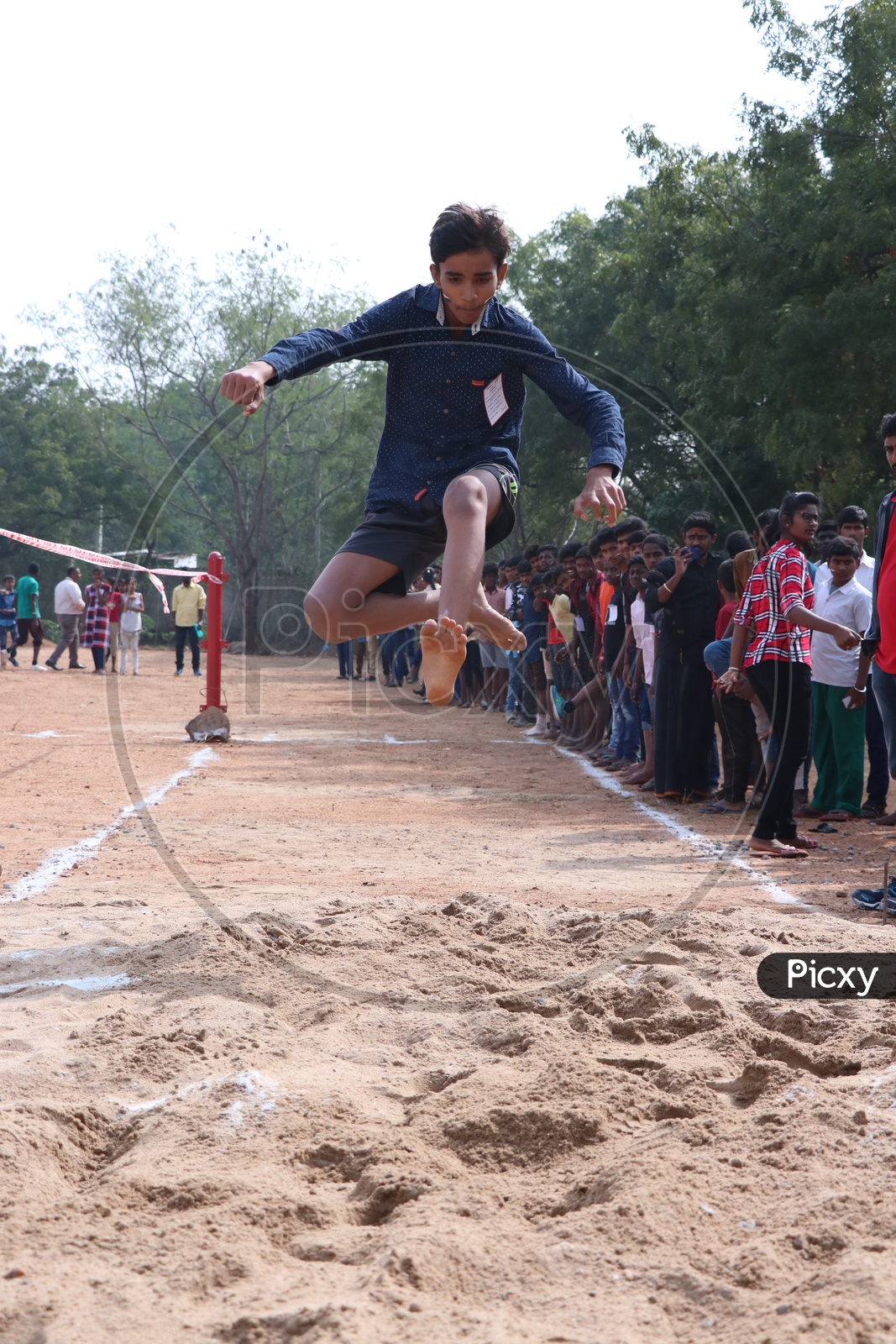 Image of Indian School Students Or Children Participating In Long Jump ...
