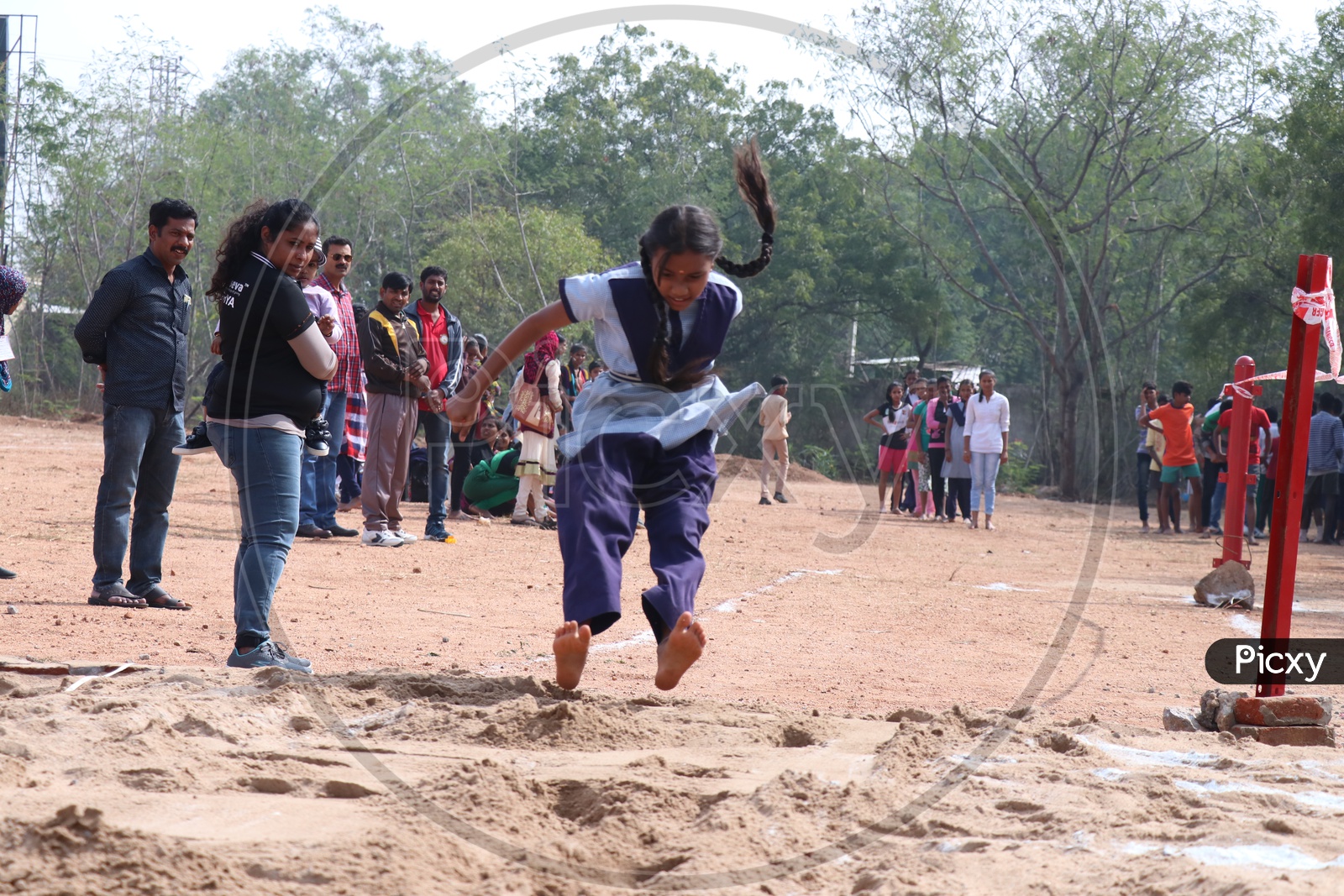 Image of Indian School Students Or Children Participating In Long Jump ...